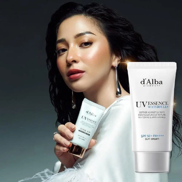 A woman with radiant skin holds a tube of 2PCS 50ml Full Body UV Protection Sunscreen for hydrating, refreshing, and breathable sun protection. On the right, the product is shown with SPF 50+ PA++++ visible on its label.